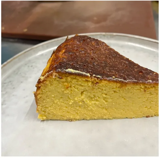 Slice of Mexican flan dessert on a plate