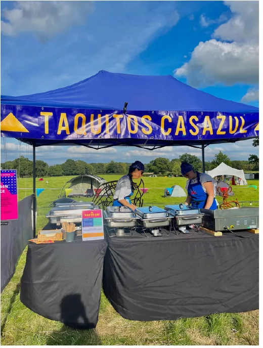 Taquitos Casazul outdoor catering tent with food warmers